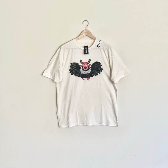 NEW Cowboy Mothman Guild of Calamity Stephanie Bayles Cream T Shirt Adult Large - Picture 1 of 6
